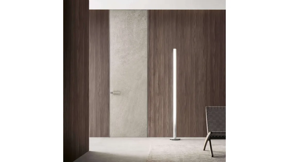 Porta a filo muro per interni Moon in finitura gres crema con struttura in alluminio finitura Platino di Rimadesio