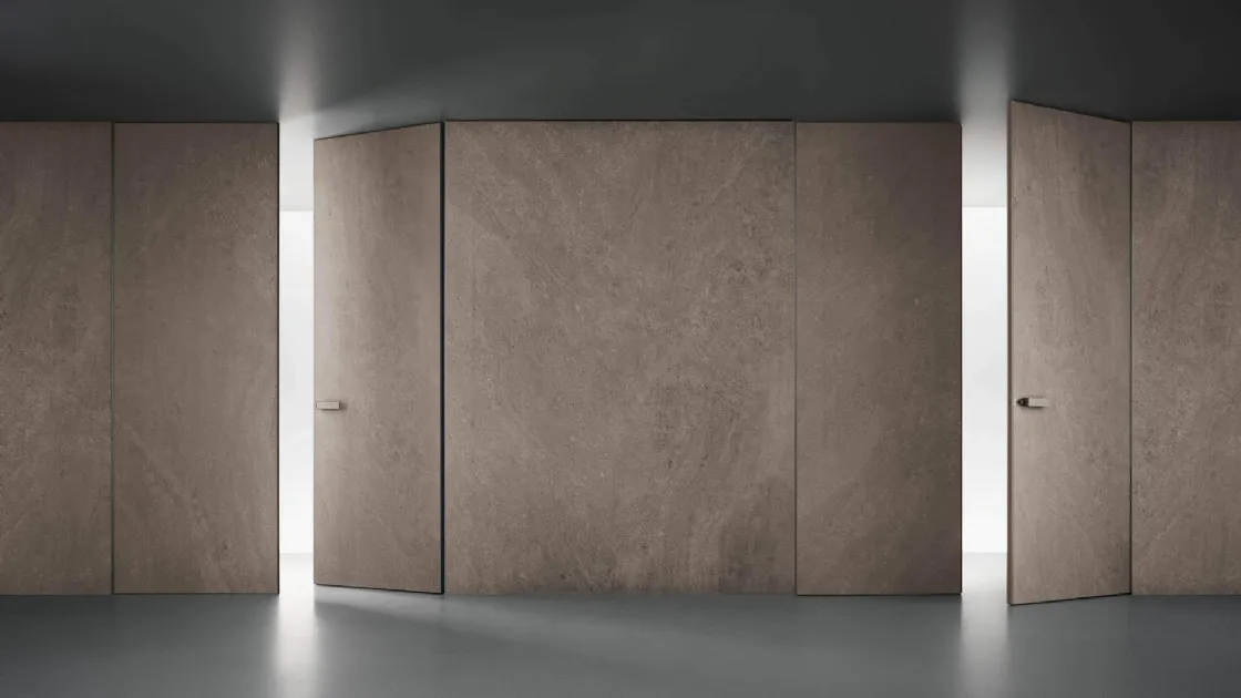 Porta a battente per interni Moon in finitura Gres Moka di Rimadesio